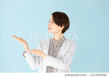 Female business portrait hand waving 123189498