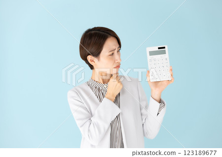 Woman business portrait calculator worries 123189677