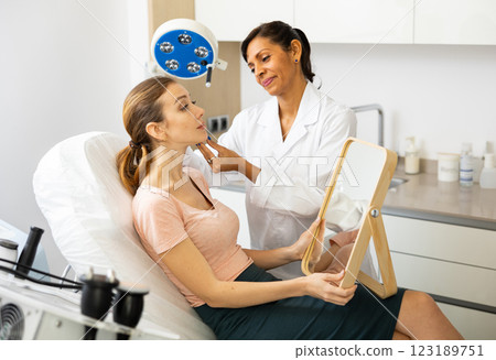 Woman having consultation at aesthetic medicine clinic 123189751