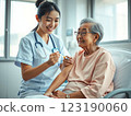 nurse giving injection 123190060
