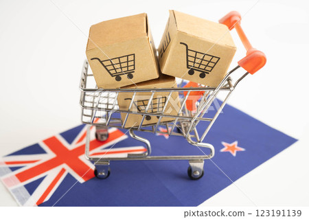 Online shopping, Shopping cart box on The United Kingdom flag, import export, finance commerce. Online shopping, Shopping cart box on The United Kingdom flag, import export, finance commerce. 123191139