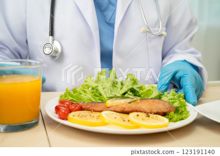 Asian Nutritionist holding healthy food for patient in hospital, nutrition and vitamin. Asian Nutritionist holding healthy food for patient in hospital, nutrition and vitamin. 123191140