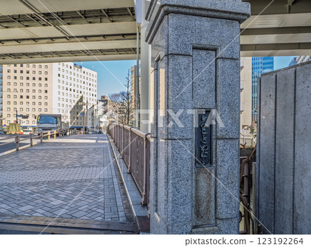 The main pillars and nameplate of the "Shin-Tokiwa Bridge" spanning the Nihonbashi River The main pillars and nameplate of the "Shin-Tokiwa Bridge" spanning the Nihonbashi River 123192264