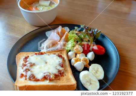 Breakfast plate with cheese toast and vegetable soup Breakfast plate with cheese toast and vegetable soup 123192377