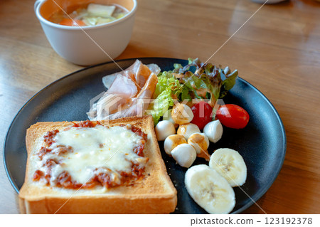 Breakfast plate with cheese toast and vegetable soup 123192378