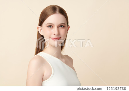 Beautiful young woman with clean fresh skin on beige background, Face care, Facial treatment, Cosmetology, beauty and spa, women portrait. Beautiful young woman with clean fresh skin on beige background, Face care, Facial treatment, Cosmetology, beauty and spa, women portrait. 123192788