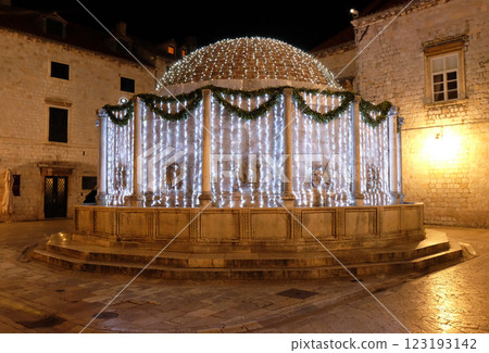 Onofrio fountain decorated with Christmas lights and ornaments, shining in the romantic atmosphere, Dubrovnik, Croatia 123193142