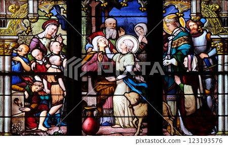 Saint Genevieve giving sight to his mother in the presence of Saint Marcel, stained glass window in Saint Severin church in Paris Saint Genevieve giving sight to his mother in the presence of Saint Marcel, stained glass window in Saint Severin church in Paris 123193576