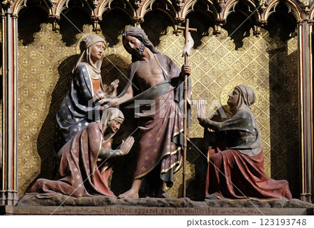 Appearance to the holy women, carved and painted frieze inside Notre Dame Cathedral in Paris, France Appearance to the holy women, carved and painted frieze inside Notre Dame Cathedral in Paris, France 123193748
