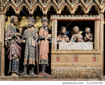 Intricately carved and painted frieze inside Notre Dame Cathedral depicting Appearance to the disciples at Emmaus, UNESCO World Heritage Site in Paris, France  123193749