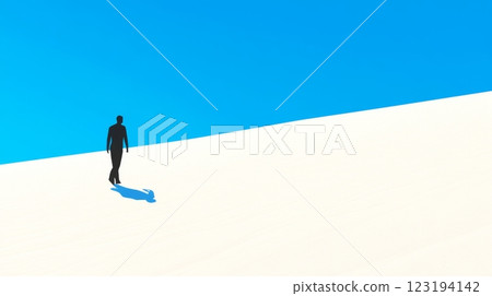 Lonely traveler walks across a serene, sunlit desert landscape 123194142