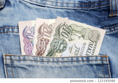 Falkland Islands pound  in the pocket of blue jeans 123195090