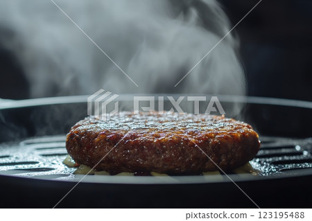 Juicy Grilled Beef Burger Patty Cooking on Pan with Steam hot meat food meal steak smoke brown lunch 123195488