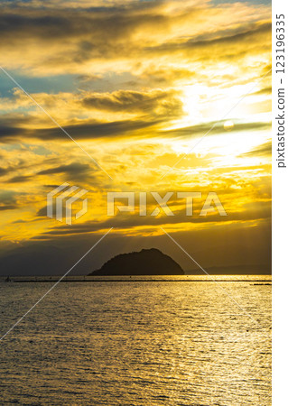 [Lake Biwa scenery] The fantastic Chikubu Island floating in the autumn evening scenery 123196335