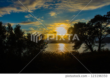 [Lake Biwa scenery] The fantastic Chikubu Island floating in the autumn evening scenery 123196350