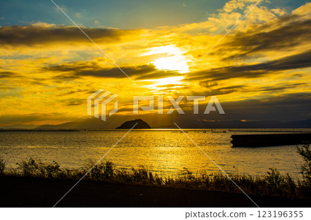[Lake Biwa scenery] The fantastic Chikubu Island floating in the autumn evening scenery 123196355