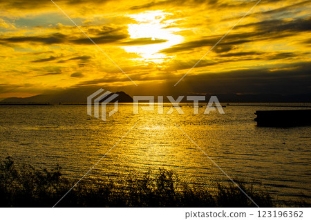 [Lake Biwa scenery] The fantastic Chikubu Island floating in the autumn evening scenery 123196362