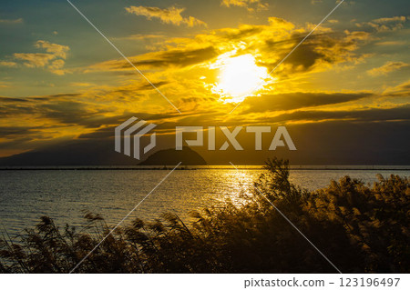 [Lake Biwa scenery] The fantastic Chikubu Island floating in the autumn evening scenery 123196497