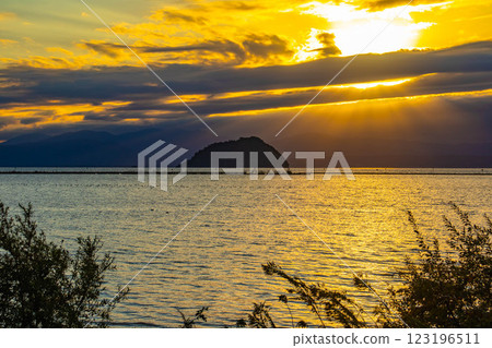 [Lake Biwa scenery] The fantastic Chikubu Island floating in the autumn evening scenery 123196511