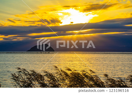 [Lake Biwa scenery] The fantastic Chikubu Island floating in the autumn evening scenery 123196516