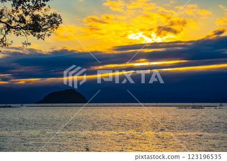[Lake Biwa scenery] The fantastic Chikubu Island floating in the autumn evening scenery 123196535