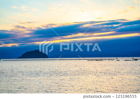 [Lake Biwa scenery] The fantastic Chikubu Island floating in the autumn evening scenery 123196555
