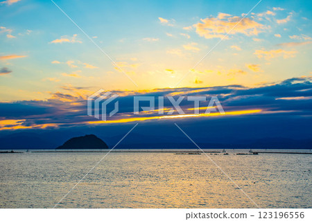 [Lake Biwa scenery] The fantastic Chikubu Island floating in the autumn evening scenery 123196556