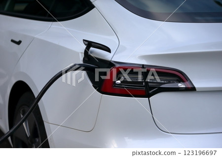 Electric car under charge Electric car under charge 123196697