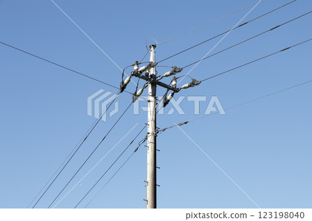 Telephone pole in the blue sky Telephone pole in the blue sky 123198040
