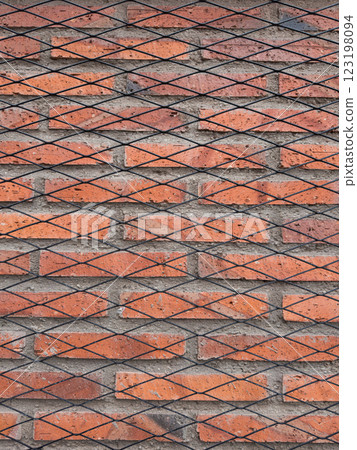 Textured red brick wall with black diagonal patterns for background design Textured red brick wall with black diagonal patterns for background design 123198094