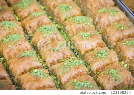 Turkisch baklava. Sweet pastry made of layers filo dough with pistachio, nuts and honey 123198234
