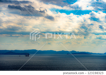 An island floating in the sea An island floating in the sea 123198323