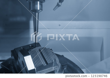 The 5-axis CNC milling machine cutting the automotive part with solid ball end mill tool. 123198746