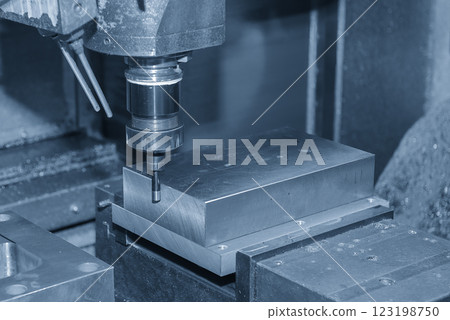 The operation of edge finder for center setup for CNC milling machine. 123198750