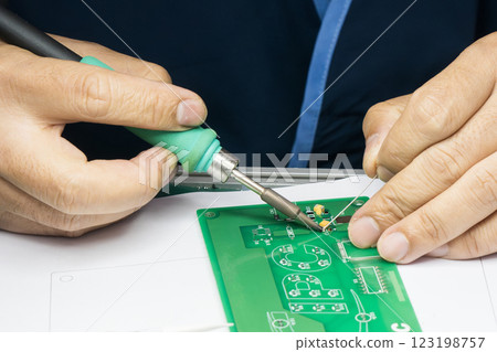 Close up scene the soldering operation by skill operator. Close up scene the soldering operation by skill operator. 123198757