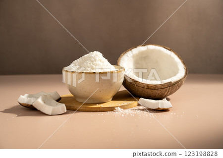 Fresh coconut flour, desiccated dried coconut flash  123198828