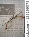 English newspaper and glasses (vertical, center) 123199575