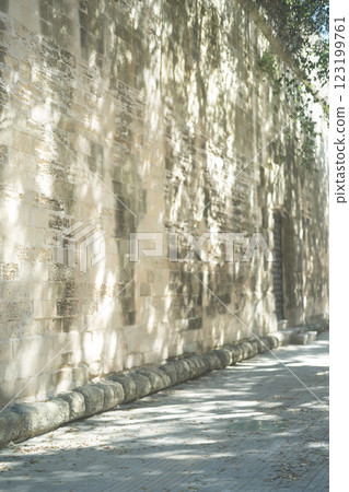 Old stone walls and shadows of light in southern Italy (layers of history and time) 123199761