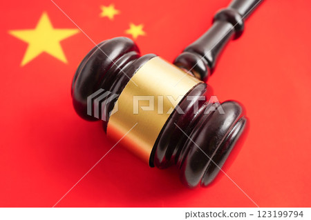 Judge wooden gavel on national China flag. 123199794