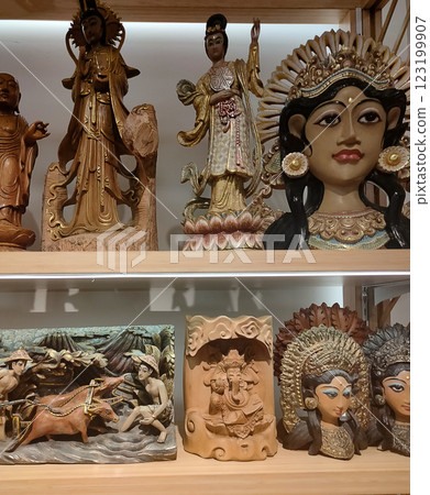 Bunch of handmade wood crafted souvenirs figurines of Balinese traditional style 123199907