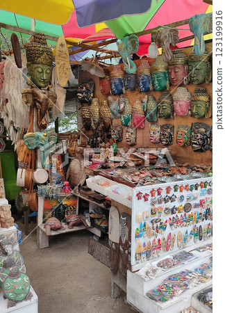 Typical souvenirs and handicrafts of Bali at the famous Ubud Market 123199916