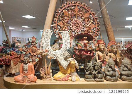 Bunch of handmade wood crafted souvenirs figurines of Balinese traditional style Bunch of handmade wood crafted souvenirs figurines of Balinese traditional style 123199935