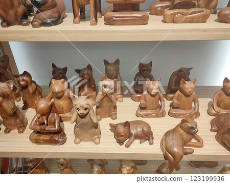 Bunch of handmade wood crafted souvenirs figurines of Balinese traditional style Bunch of handmade wood crafted souvenirs figurines of Balinese traditional style 123199936