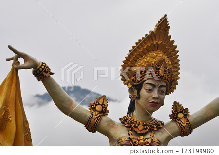 A colorful statue beautifully showcasing traditional dance attire in Ulun Danu Beratan Temple A colorful statue beautifully showcasing traditional dance attire in Ulun Danu Beratan Temple 123199980