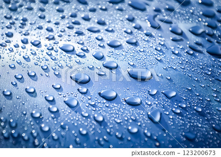 Image of water droplets and a water-repellent car hood (blue) Image of water droplets and a water-repellent car hood (blue) 123200673