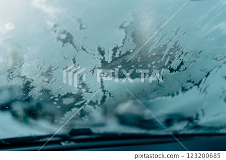 Frozen Vision (view through a windshield in winter) 123200685