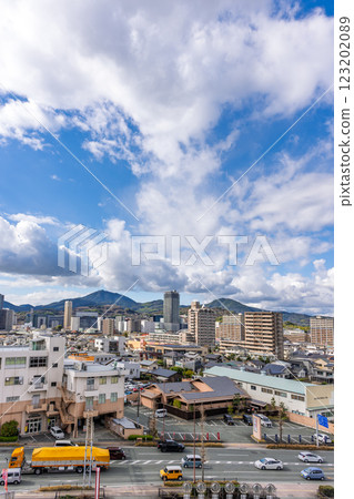 (Mt. Kinpu, cityscape) Panoramic cityscape with the mountain range in the background (Yoan-cho, Kumamoto City) (Mt. Kinpu, cityscape) Panoramic cityscape with the mountain range in the background (Yoan-cho, Kumamoto City) 123202089