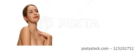 Banner. Elegant woman tilting head and resting hand on shoulder against white studio background with negative space to insert text. Banner. Elegant woman tilting head and resting hand on shoulder against white studio background with negative space to insert text. 123202752
