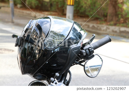 Black motorcycle helmet 123202907