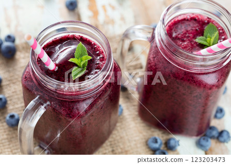 Berry smoothie on wooden table 123203473